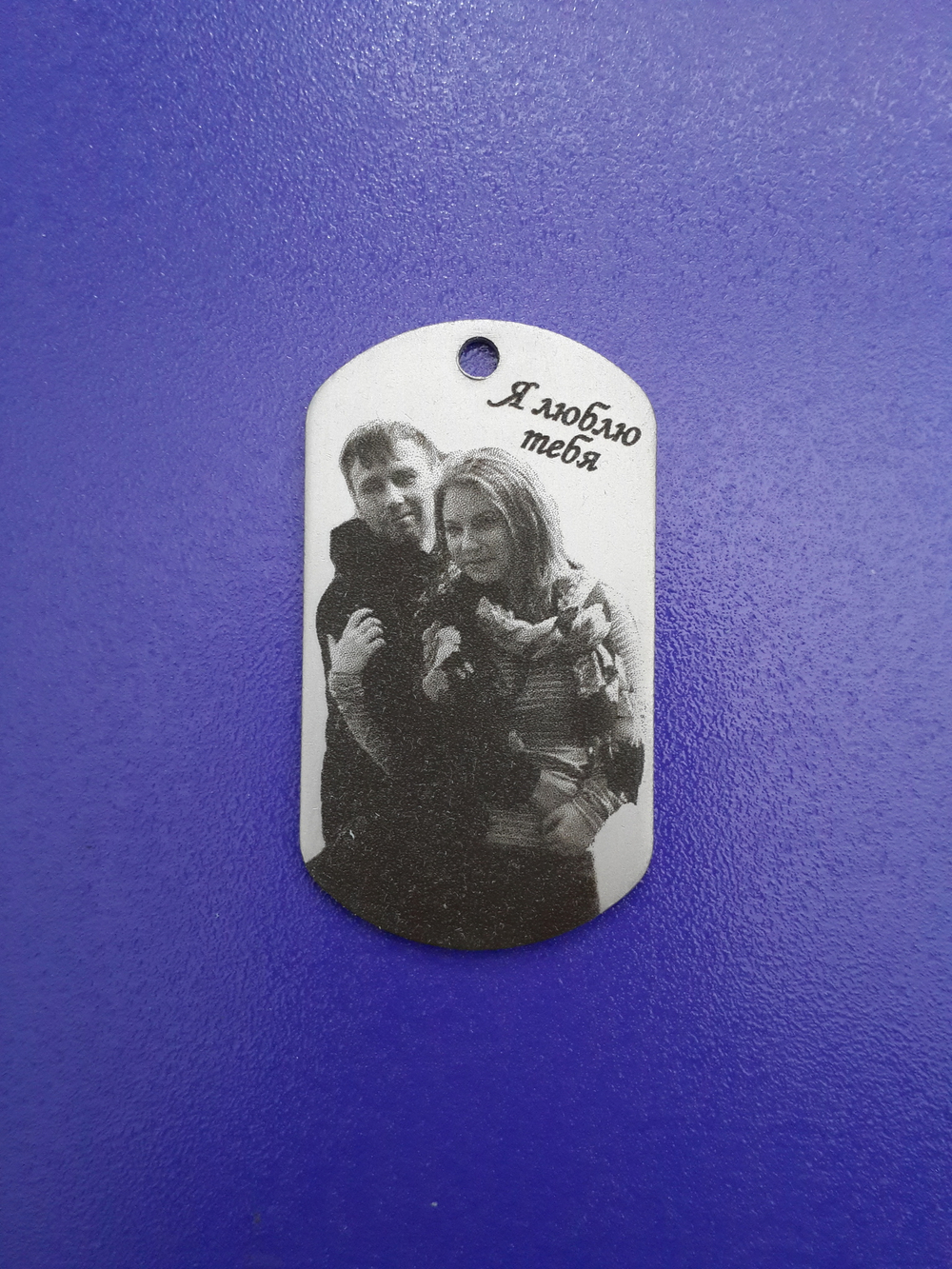 Стальной жетон с изображением