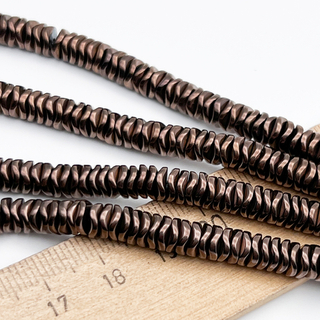 Гематит Рондель бусины (имитация), цвет коричневый, размер около 2*5,8 мм, цена за отрезок 9-9,5 см (1/4 нити)