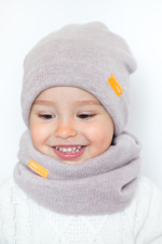 детская шапка из турецкой шерсти молочная