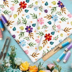 Ткань кулирная гладь яркие цветы и листья на белом фоне