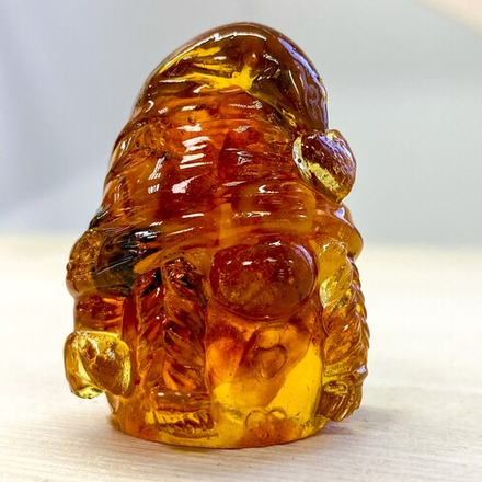 Гном в шапке с косичками