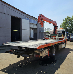 Эвакуаторная платформа 4.5 т с КМУ 3.2 т на шасси Isuzu Elf KV600