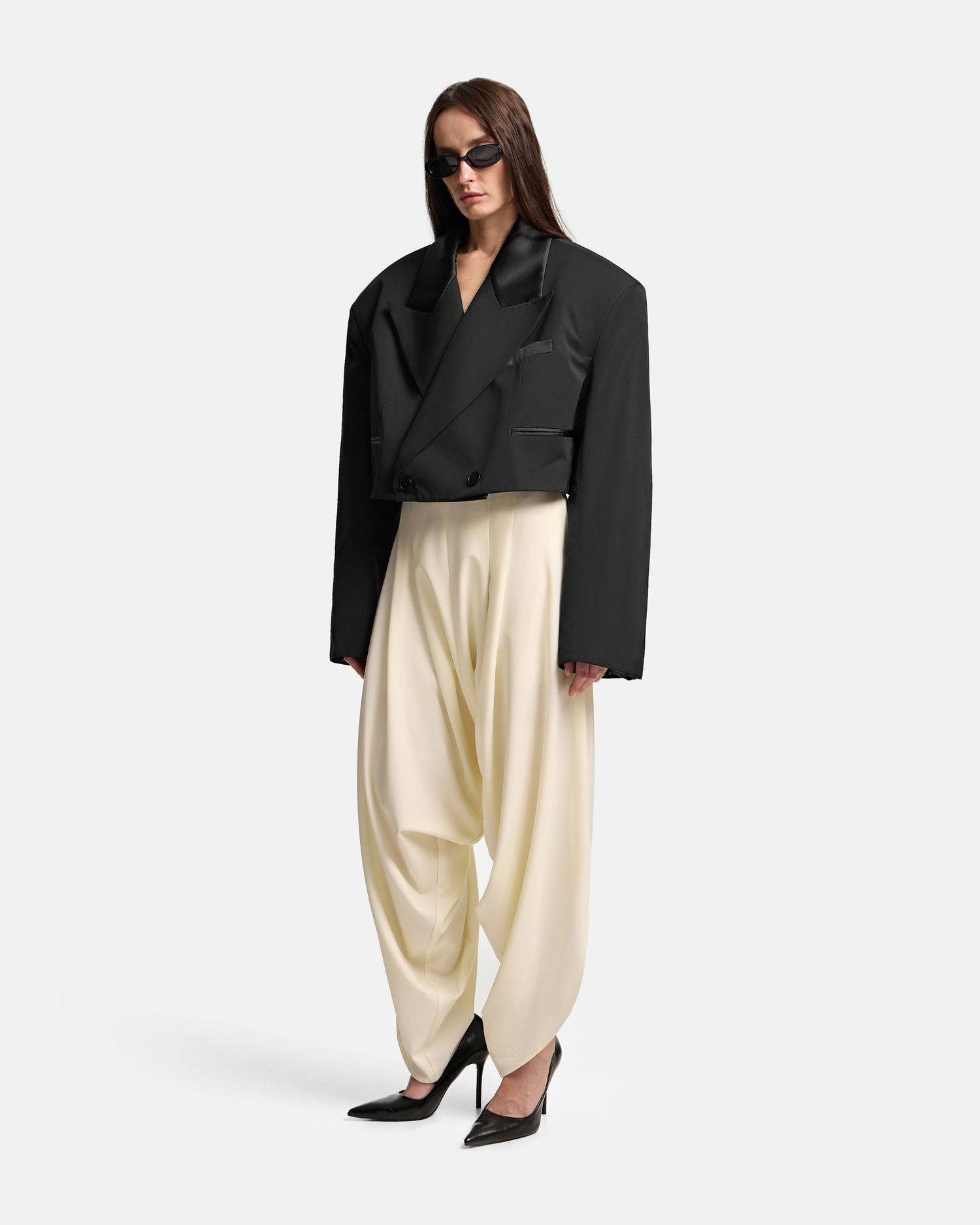 Брюки с защипами