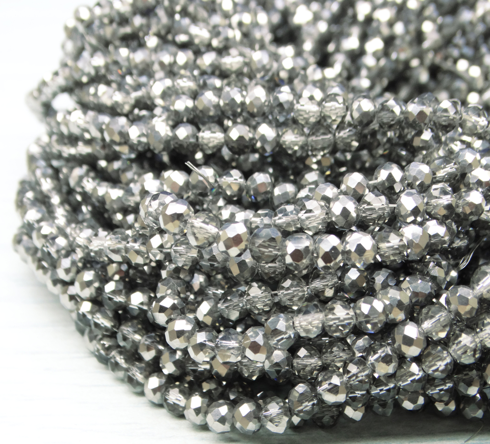 БП060ДН34 Хрустальные бусины "рондель", цвет: белый с серебристым AB, 3х4 мм, кол-во: 95-100 шт.