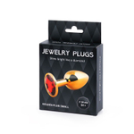 Золотистая анальная пробка с красным стразом - 7,2 см. (Цвет: красный)