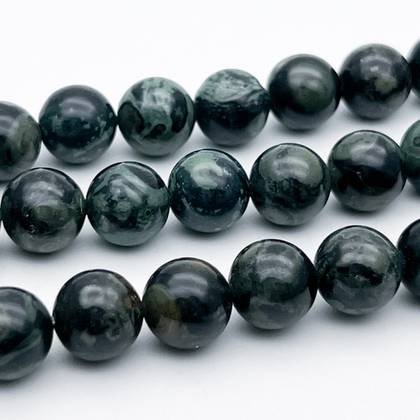 "Яшма камбаба" (риолит), диаметр около 10,5-10,7 мм, цена за 18 шт (1/2 нити)