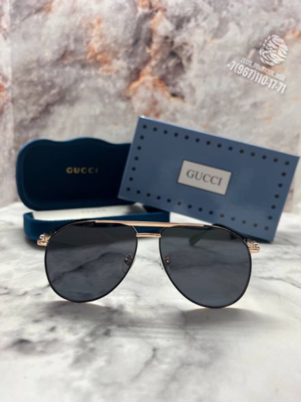 Солнцезащитные очки Gucci