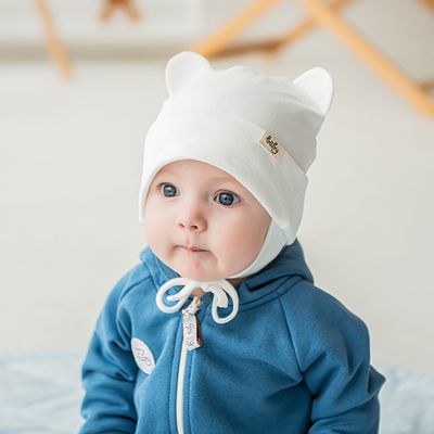 Two-ply jersey hat with earflaps 3-18 months - Heavy Cream