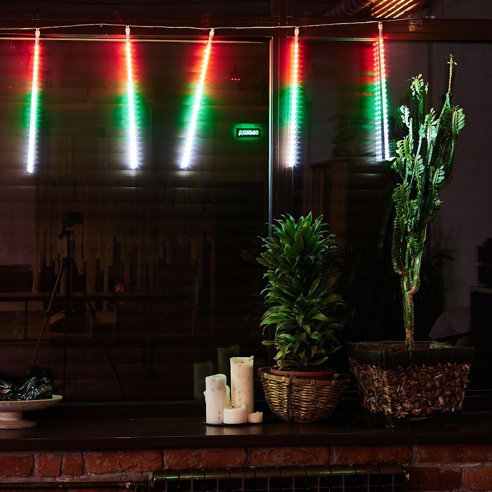 ULD-E2405-240-DTK MULTI IP44 METEOR Занавес светодиодный фигурный Падающие звезды. соединяемый. 2х0.5м. 8 подвесов. Разноцветный свет. Провод прозрачный. TM Uniel.