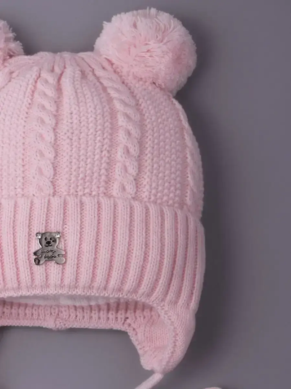 Шапка детская вязаная демисезонная на завязках