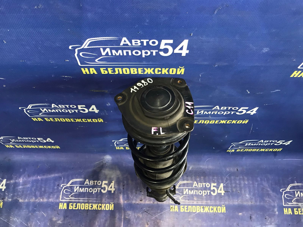 Стойка передняя левая NISSAN TIIDA 2004-2012
