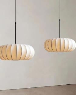 Подвесной светильник с мягкими округлыми формами и текстурным плафоном.