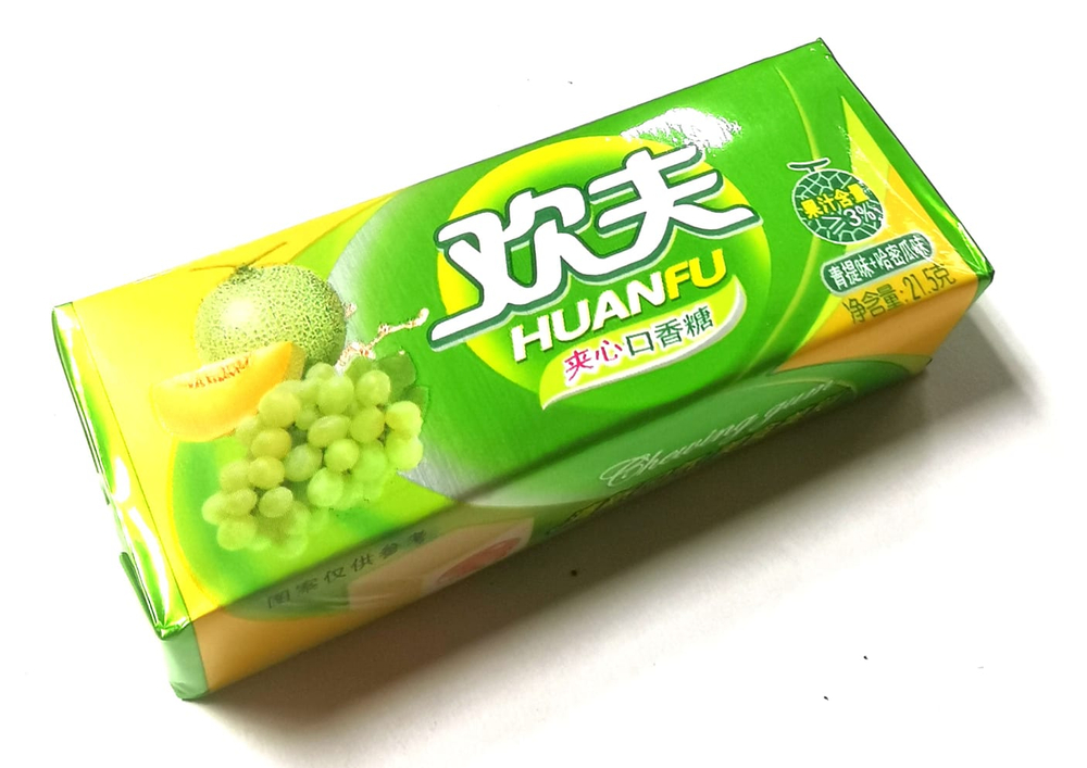 Жевательная резинка Huanfu с начинкой дыня виноград 21,5гр
