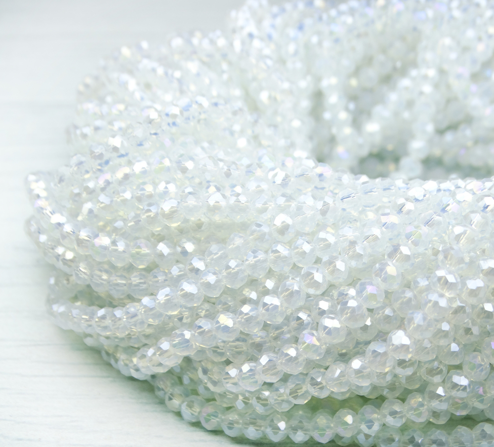 БМ002ДС46 Хрустальные бусины "рондель", белый (имитирующий опал) AB, 4х6 мм, кол-во: 58-60 шт.