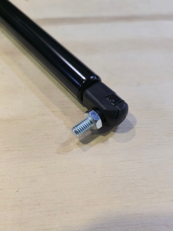 Амортизатор МАЗ-5440, 6430 облицовки радиатора (пружина газовая, усилие F320H) MEGAPOWER