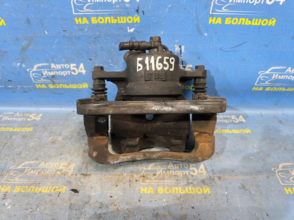 Суппорт тормозной передний левый TOYOTA RAV4 2005-2013