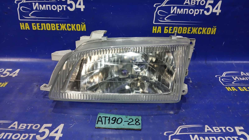 Фара передняя левая TOYOTA CARINA E 1992