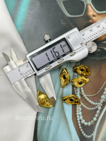 Пуговицы золотистые в форме глаза Скиапар.