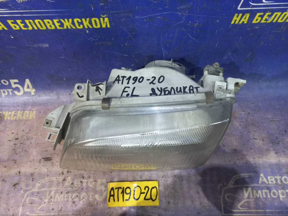 Фара передняя левая TOYOTA CARINA E 1995