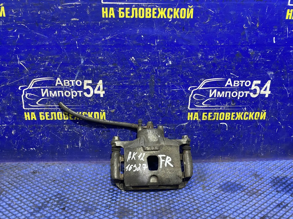 Суппорт тормозной передний правый NISSAN MARCH 2002-2010