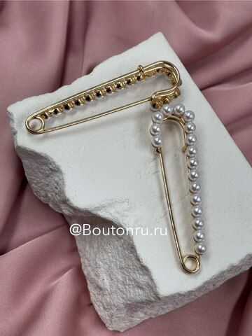 Брошь золотистая 