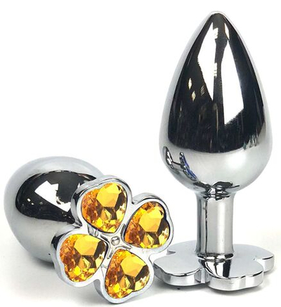 Серебристая анальная втулка с клевером из оранжевых кристаллов - 9 см. (Цвет: оранжевый)