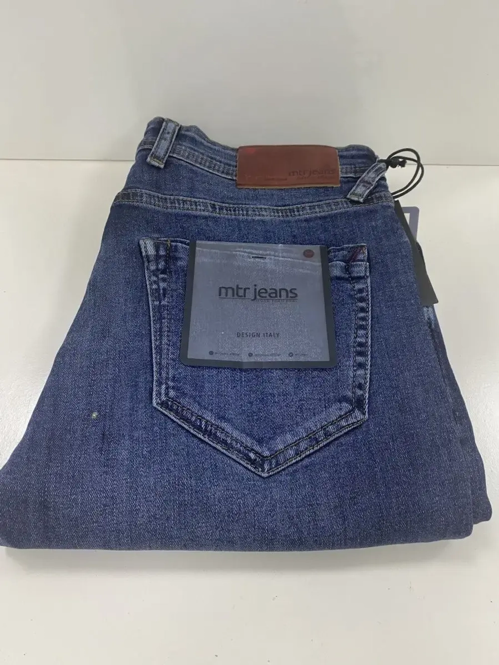 Джинсы мужские