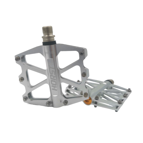 Педали алюминий H518 широкие, ось Cr-Mo на промах сменные шипы 91*101*11мм, 340 г серебро HORST