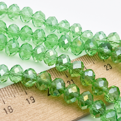 Бусины рондель с огранкой, стекло, цвет салатовый, размер около 6,3*7,8 мм, цена за 29-30 шт (1/2 нити)