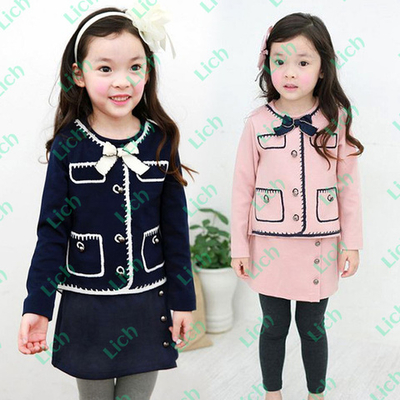 Костюм из жакета на пуговицах с бантом и леггинсов с юбкой