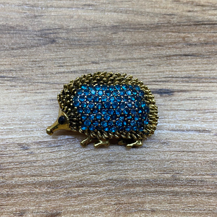 Брошь Ежик стразы голубые металл золотистый черненый