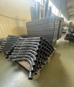 Гибка круглых труб разного диаметра и стали по радиусу - услуги на заказ