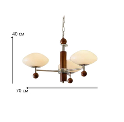 Этот светильник — стильная комбинация дерева, металла и матового стекла.