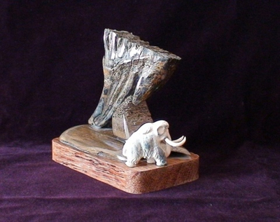 Зуб мамонтенка