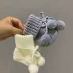 Пинетки вязаные на завязках с помпончиками