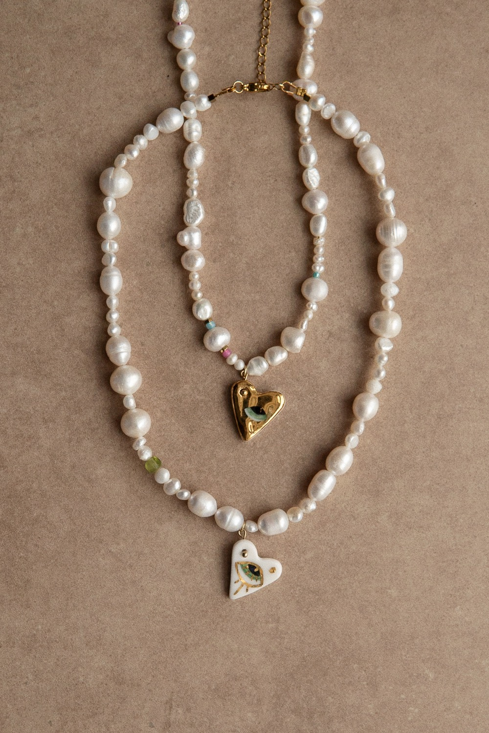 Цепь из жемчуга с фарфоровым сердцем
