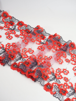 Вышивка на сетке белая с черным и красно-оранжевым неэластичная ширина 23 см ОТРЕЗЫ