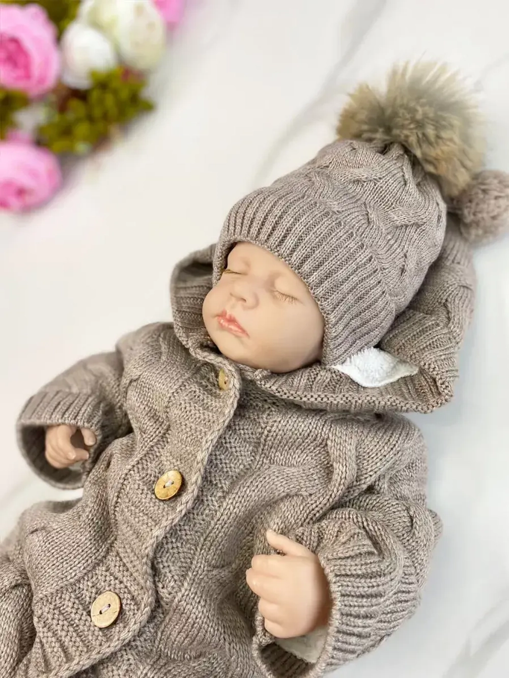 Вязаный комбинезон для новорожденных