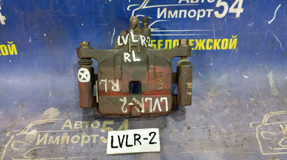 Суппорт тормозной задний левый MAZDA MPV 1996