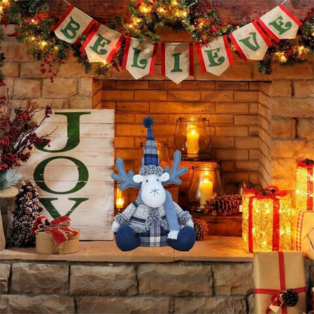 Новогодняя игрушка ручной работы, олень с рогами. Рождественское и новогоднее украшение под елку, сидячий