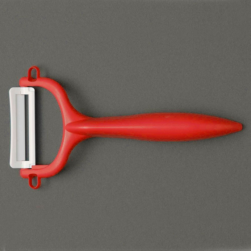 Нож для чистки с плавающим лезвием Kyocera Kitchen accessories красный Япония вид