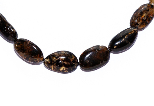 Бусы из натурального зеленого янтаря, длина 51 см, бусины до 15 на 10 мм.