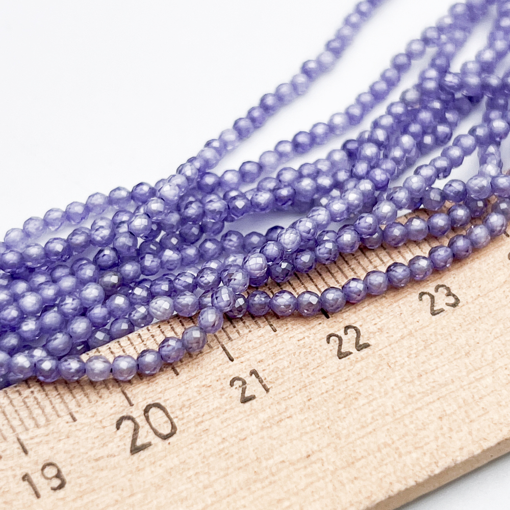 Фианит (кубический цирконий), цвет сиреневый, размер 2 мм, цена за нить около 195 шт (38 см)