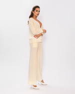 Женский трикотажный кардиган молочный на пуговицах