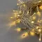 Светодиодная гирлянда с колпачком 100 теплых белых LED ламп 10 м., 24В., прозрачный провод ПВХ, IP65, LTC (PST100CAP-10-1WW)