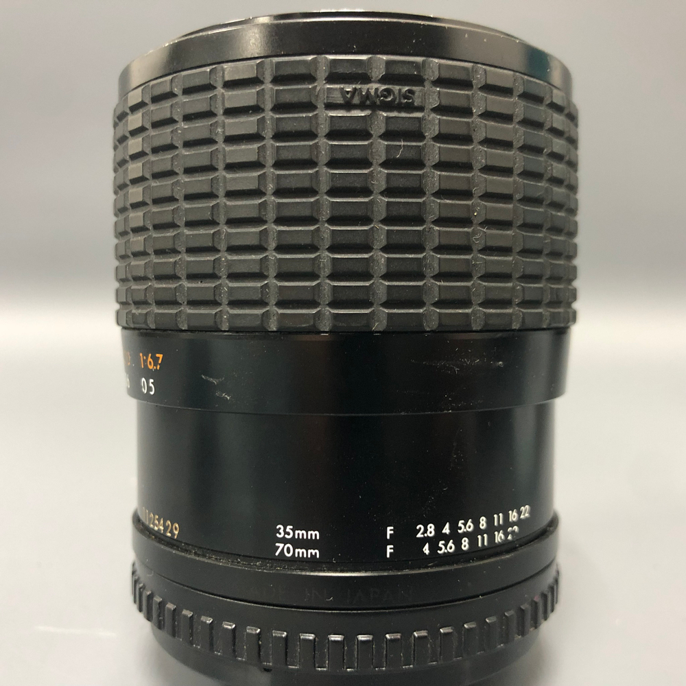 Sigma 35-70mm 2.8-4 M42 со слегка долгой диафрагмой.