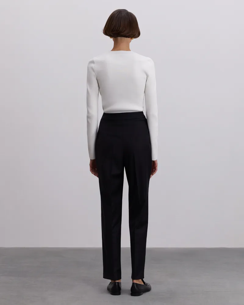 Брюки из шерсти зауженные к низу