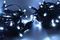 Светодиодная нить 100 холодных белых LED ламп, 10 м., 220В, статика, черный резиновый провод, Teamprof (TPF-S10C-220V-RB/W)
