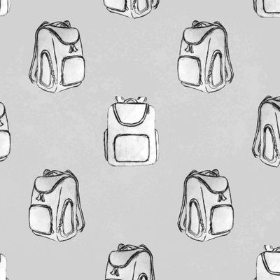 рюкзаки на сером фоне