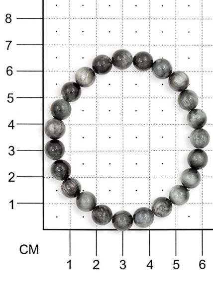 Браслет из камней кошачьего глаза фотография, на размерной сетке